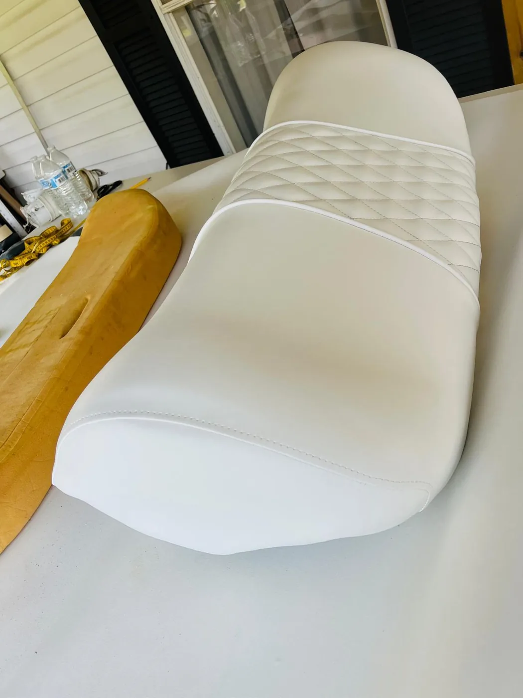 White boat seat with diamond stitched backrest detail